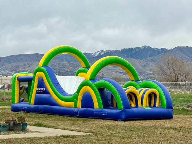 35ft Radical Run inflatable obstacle course rental at a birthday party in Salt Lake City Utah