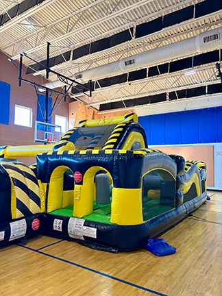 40ft obstacle course set up In a gym for students