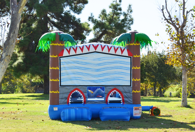 shark bounce house rental in salt lake city set up for a kids birthday party