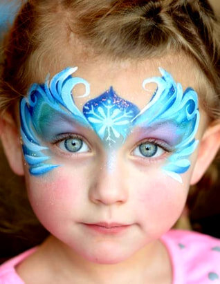 Kids smiling with detailed face painting designs including superheroes, animals, and flowers.