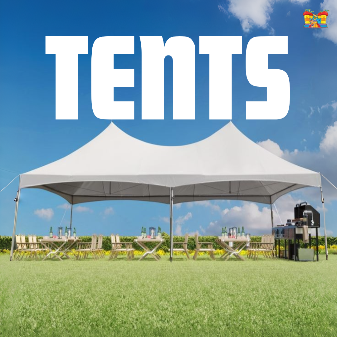 three tents with tables and chairs set up in a field