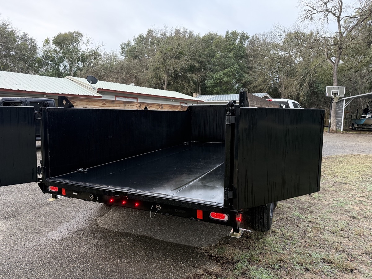 AEM Mobile Dumps trailer rear view with barn doors open for easy loading