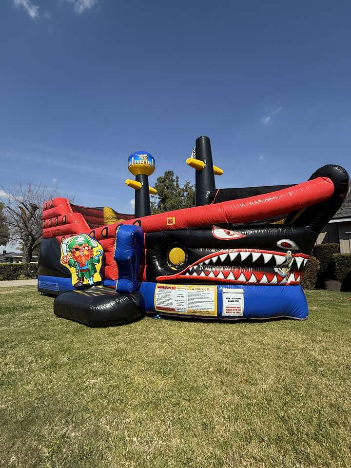 pirate ship inflatable bounce house set up at a home in Downey CA