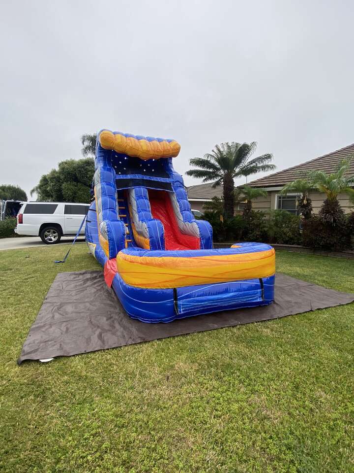 Jump With Chris water slide rental set up at a house in Downey, CA