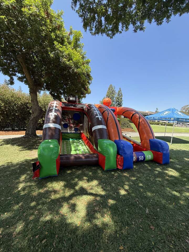 Jump With Chris inflatable sport games at Long Beach field day"