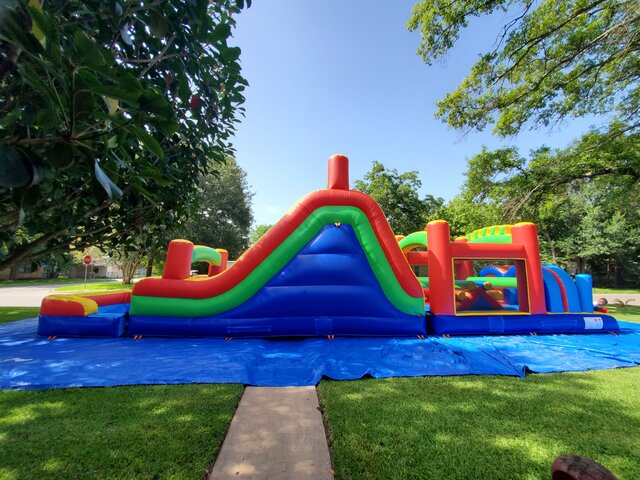 The Amazing Obstacle Couse with 19 ft High Water Slide