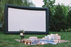 25’ Outdoor Movie screen with a projector and speakers
