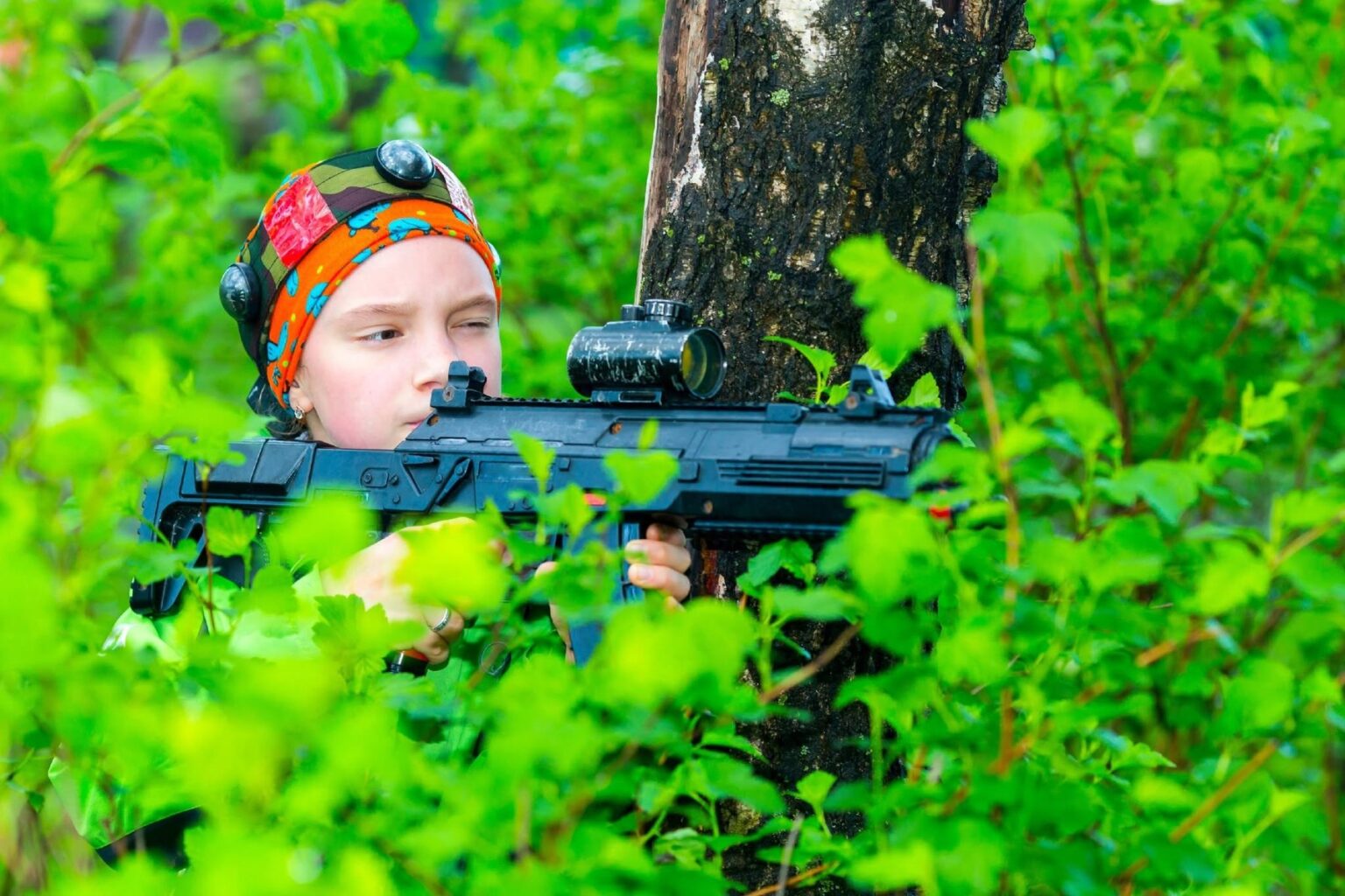Two players in a park laser tag game