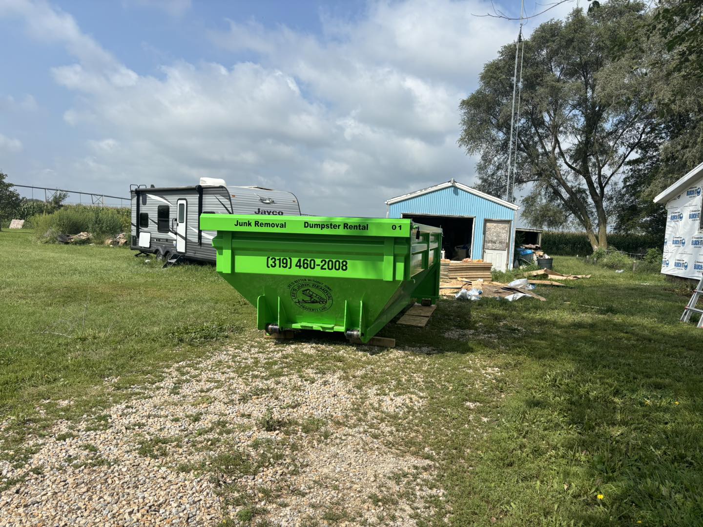 dumpster set up on a rural property ready for construction waste dumpster set up on a rural property ready for construction waste