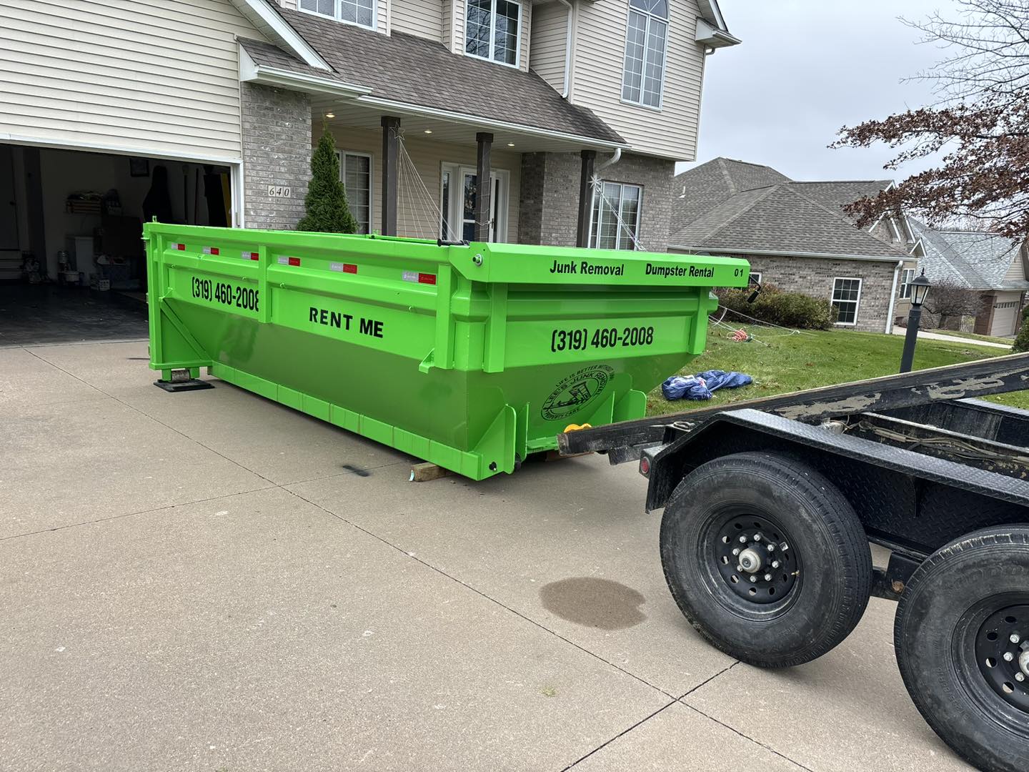 dumpster for rent placed in a residential driveway dumpster for rent placed in a residential driveway