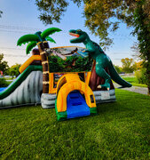 Dinosaur double lane wet or dry bounce house slide combo