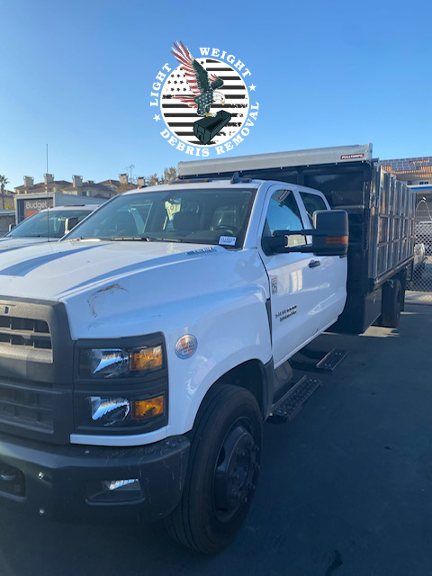 Junk Removal Truck -front left Lightweight Dumpster Rental Rancho Santa Fe CA
