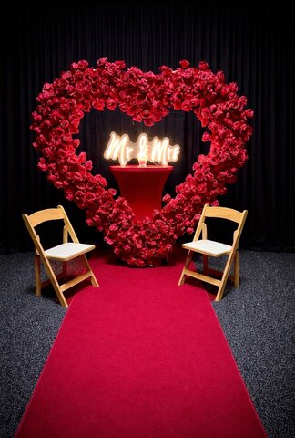 Mr and Mrs red flower heart arch