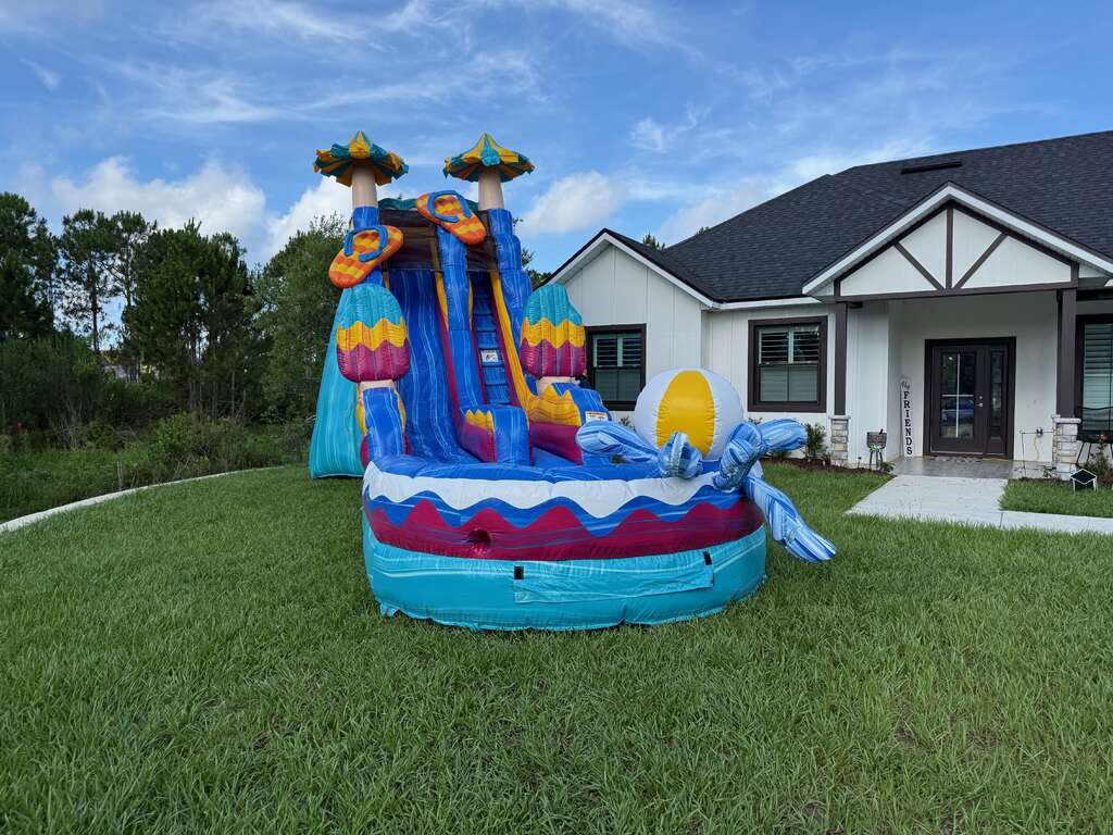 Bright inflatable water slide available for Kissimmee Florida parties
