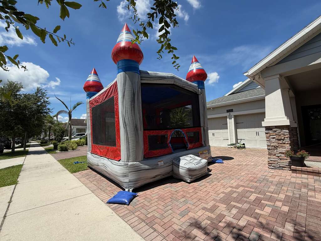 Clean castle bounce house professionally set up for a Central Florida family event