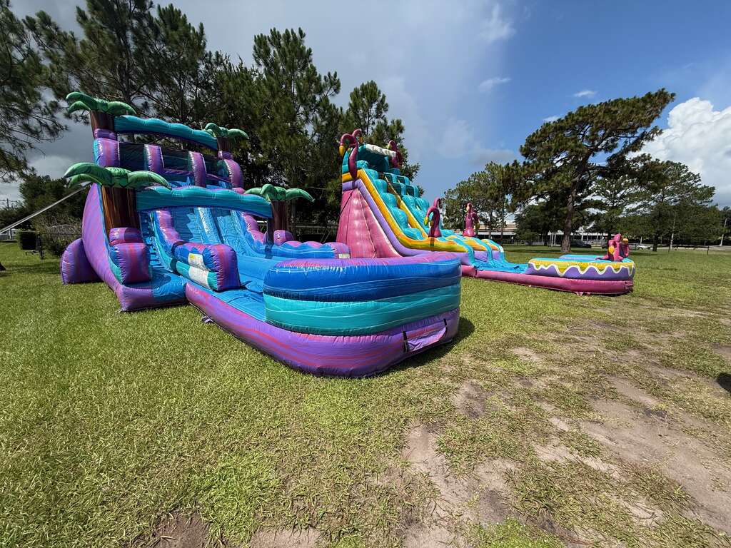 Multiple colorful inflatable attractions prepared for a Central Florida event