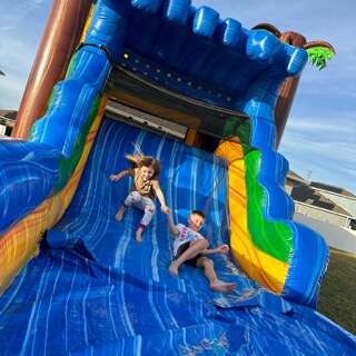 Bounce house rental in St. Cloud Florida with kids playing