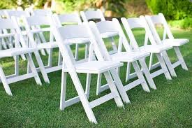 White resin folding garden chair rentals in Marina
