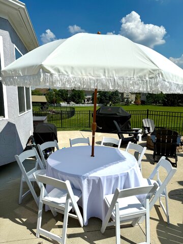 Umbrella Table with White Umbrella and White Linen