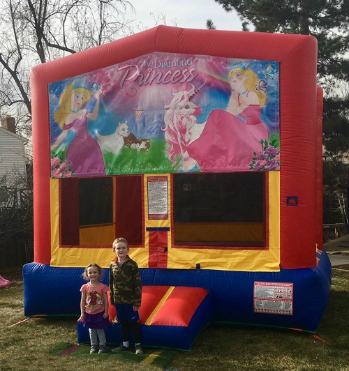 The Big House Bounce House with Happy Birthday Theme