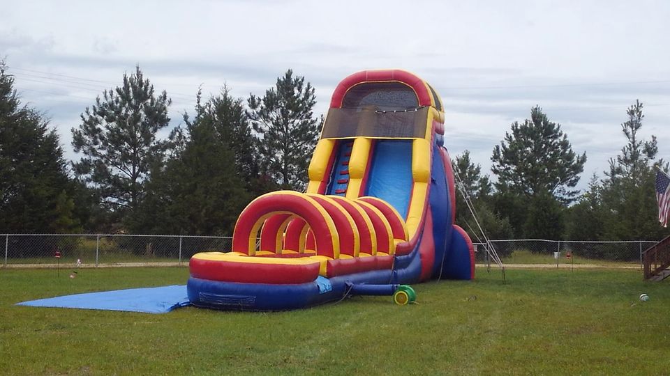 large red, yellow, and blue water slide rental dothan al