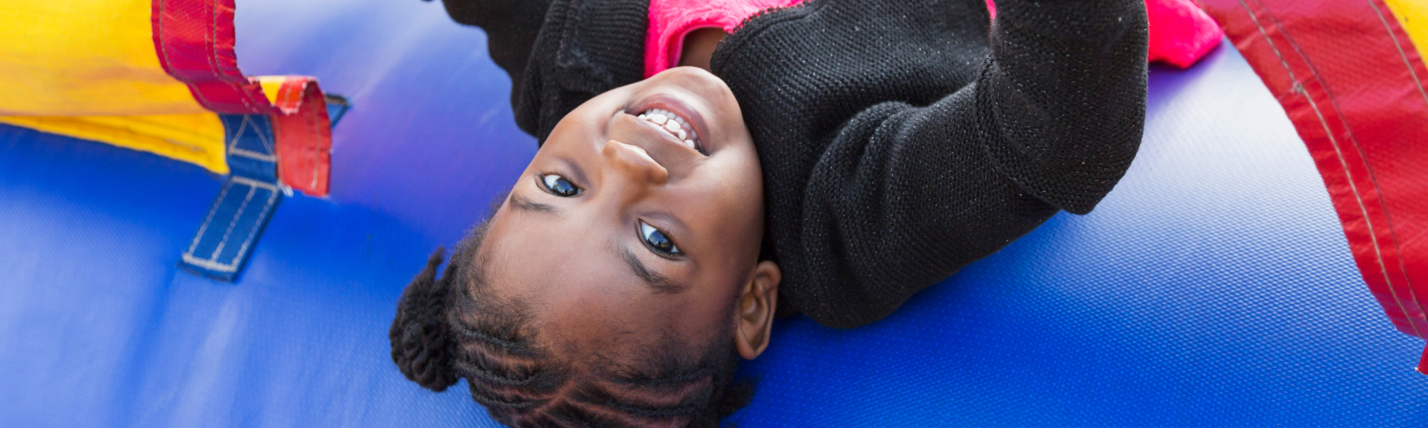 Kid enjoying bounce house