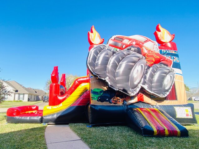 Rent Monster Truck Bounce House with Slide - Orbit Moonwalks