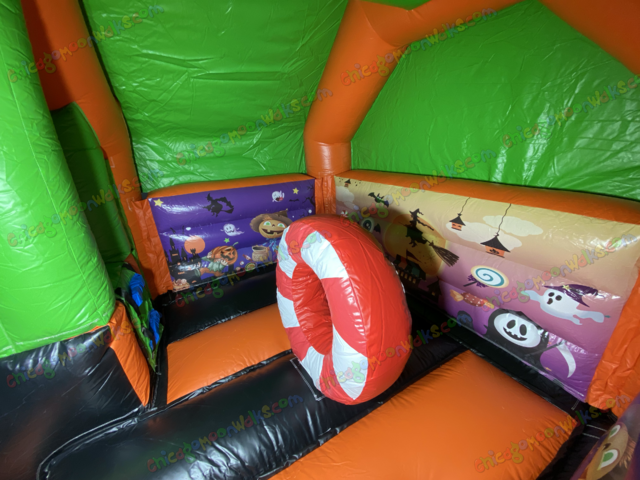 Sweet candy Halloween bounce house with slide rental Chicago