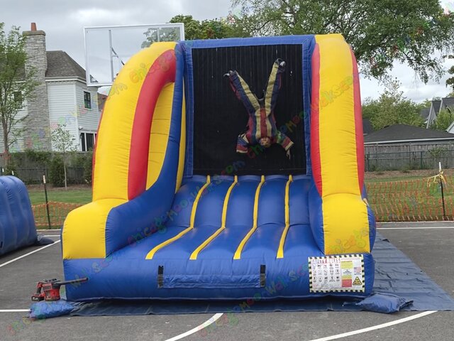 Inflatable velcro wall rental Chicago with velcro suits