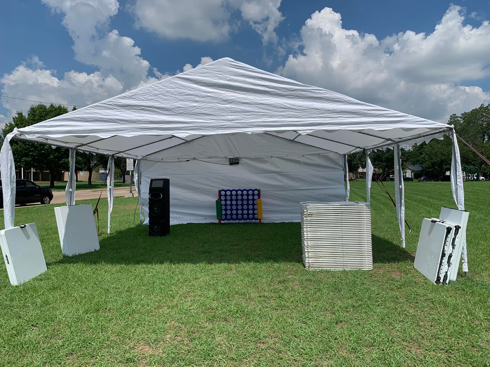 Tent and chairs by Orlando Amusements