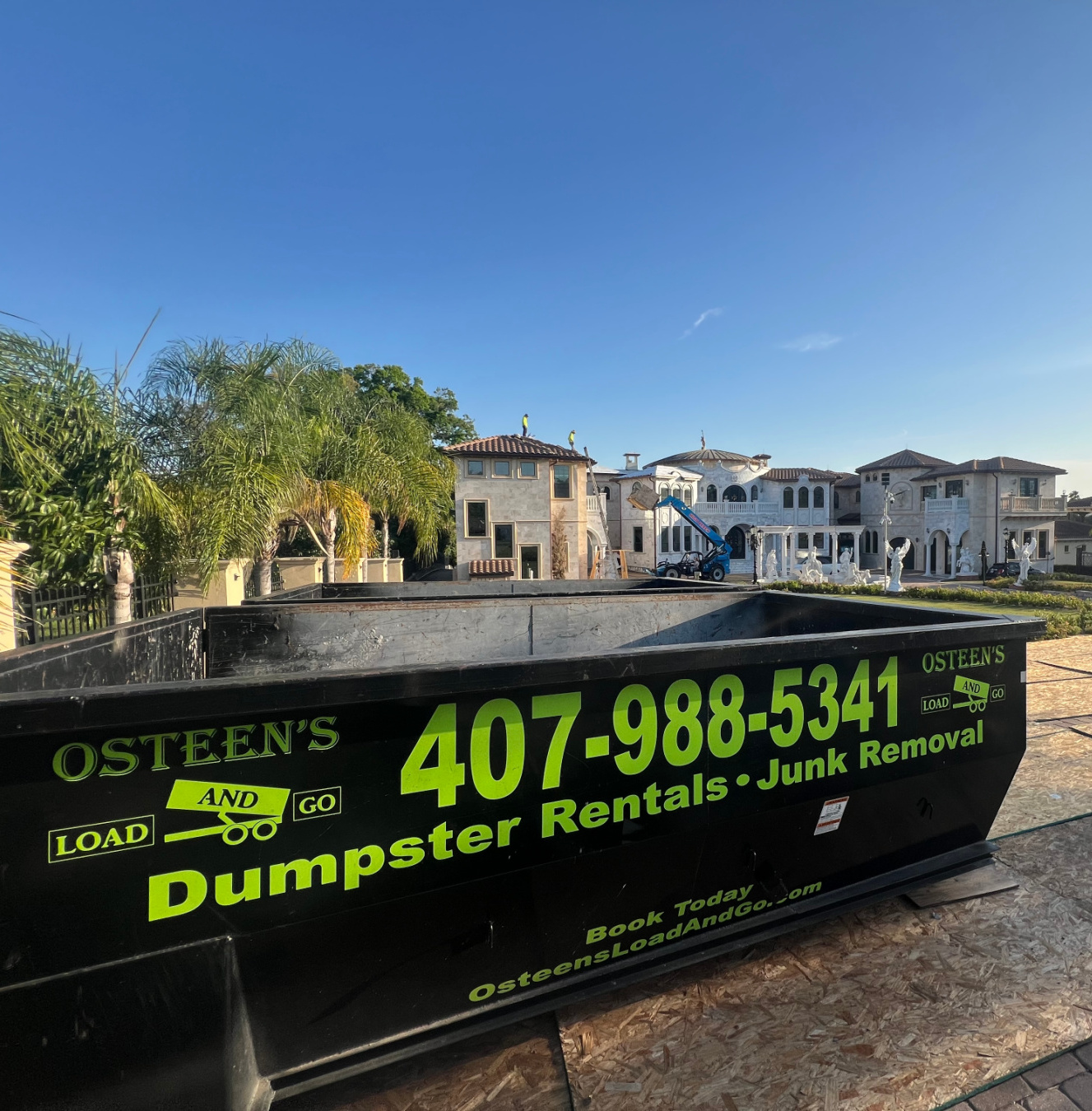 Container from Osteens Load and Go placed in a residential neighborhood