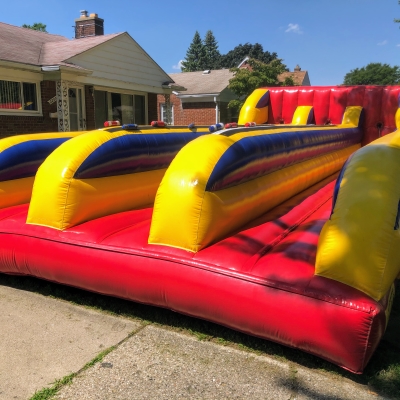 Get your bounce on with a Bouncy Castle Rental in Shelby Township MI bouncy inflatable rental with bright colors