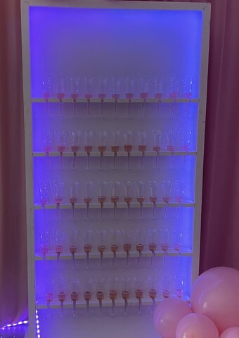 Champagne wall comes with 55 disposable champagne flutes