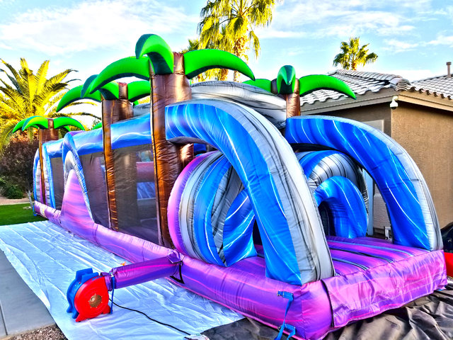 Colorful tropical inflatable obstacle course
