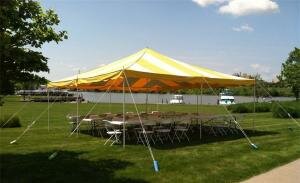Do it Yourself Set of 20 x 20 Pole Tent striped White & Yellow w/ 4 Tables and 30 Folding Chairs Brown Outdoor  (Tools Not Included) Staked in the ground