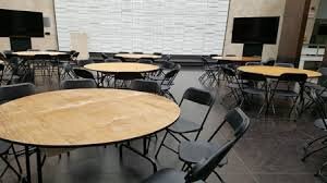 Set of 60' Round Table and 8 Brown Chairs