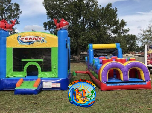 Bounce house rental set up on a lawn by Orlando Fun Bounce.