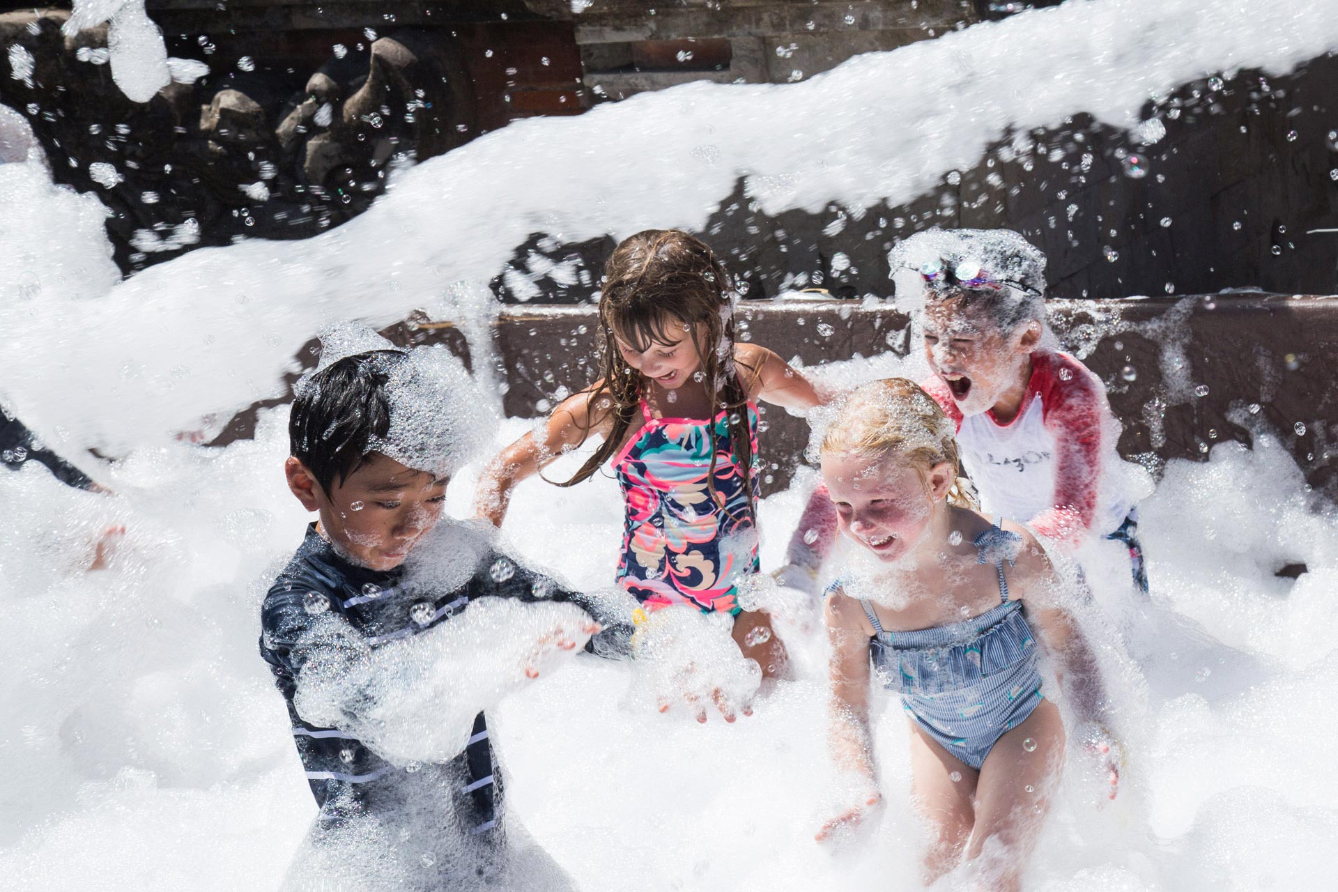 Laughing children enjoying bubbles and fun together at Foam Parties in Greer, SC. Laughing children enjoying bubbles and fun together at Foam Parties in Greer, SC.