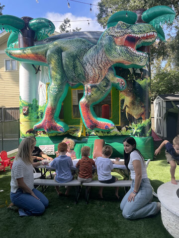 Roaring good times! 🦖✨ Nothing brings the fun like a dino bounce house and good friends. Let the adventure begin!