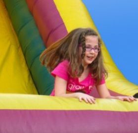 young girl in bounce slide young girl in bounce slide