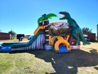TRex Dinosaur Water Bounce House with double slide rental Texas
