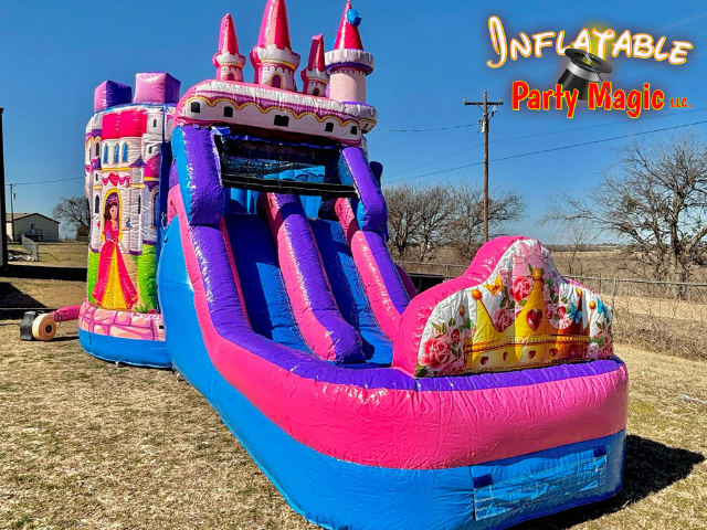 Princess Unicorn Bounce House slide view showing the double slide with castle peaks above it