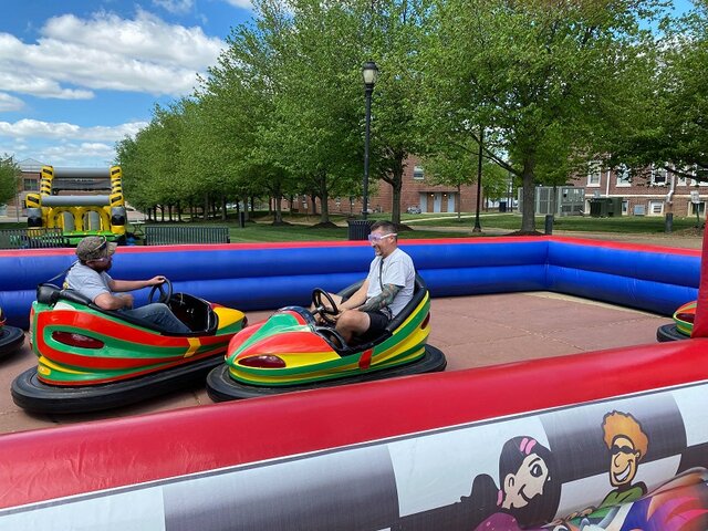 Riders in Inflatable Party Magic bumper cars