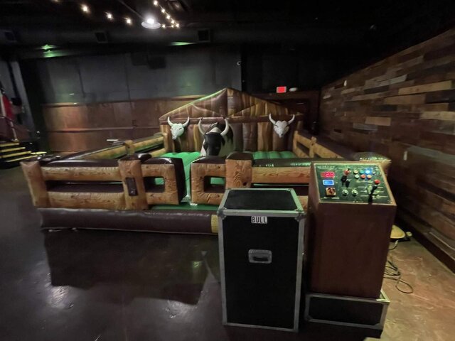 Mechanical bull rental booked for a Cedar Hill corporate event
