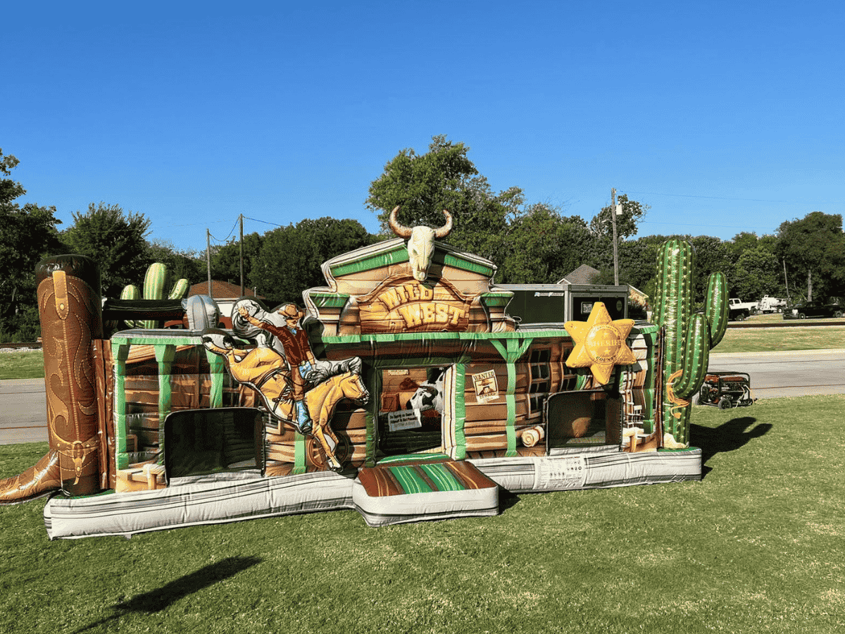Wild West toddler combo bounce house rental with an open top design at a DFW backyard birthday party for ages 2 to 5 from Inflatable Party Magic