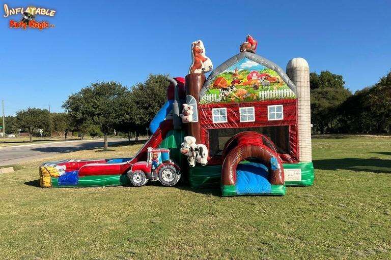 Inflatable bounce house with a slide rental set up for a birthday party in Granbury TX