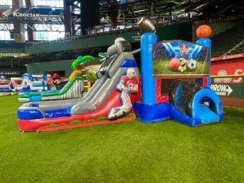 Combo bounce house with slide rental set up for an Arlington Texas birthday party by Inflatable Part…