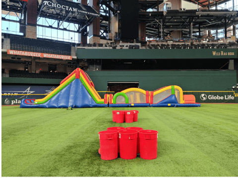 Corporate event rental setup at Globe Life Park in Arlington TX from Inflatable Party Magic