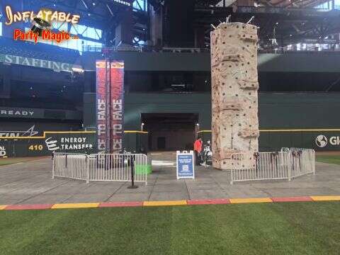 Large event with rock climbing wall and inflatable rentals set up in Weatherford TX