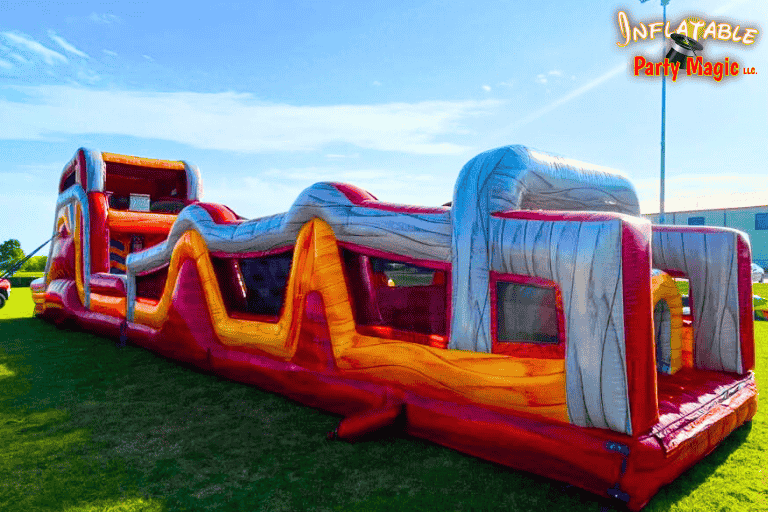 Grand Prairie bounce house obstacle course setup at an event by Inflatable Party Magic for corporate…